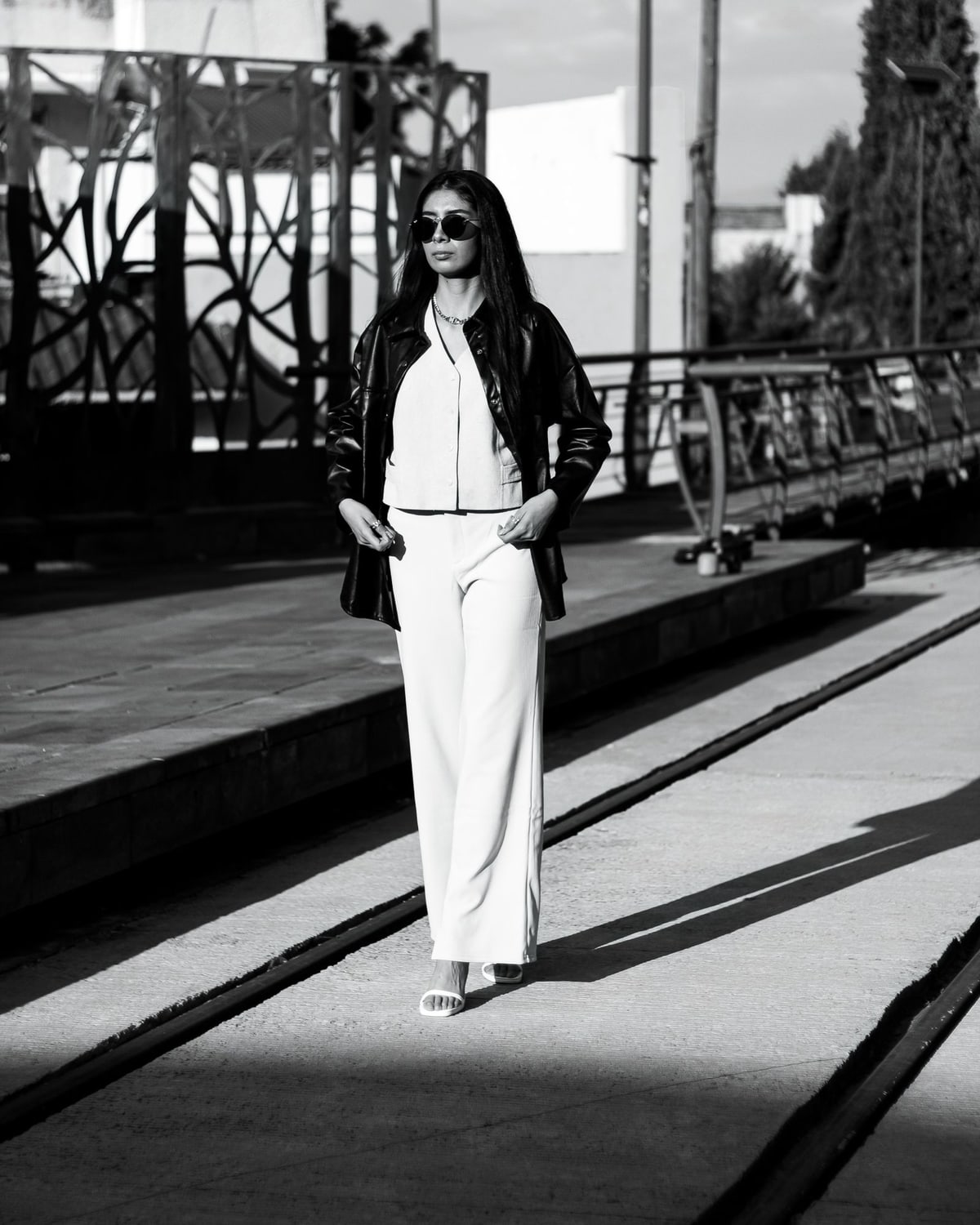 Woman wearing straight-leg jeans and a simple top